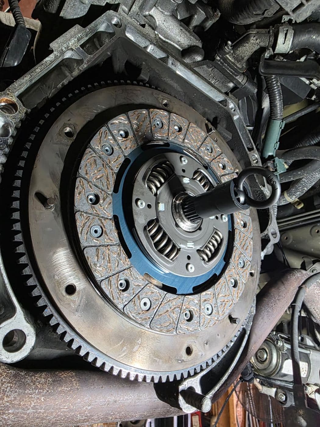 New clutch disc mounted on the engine flywheel