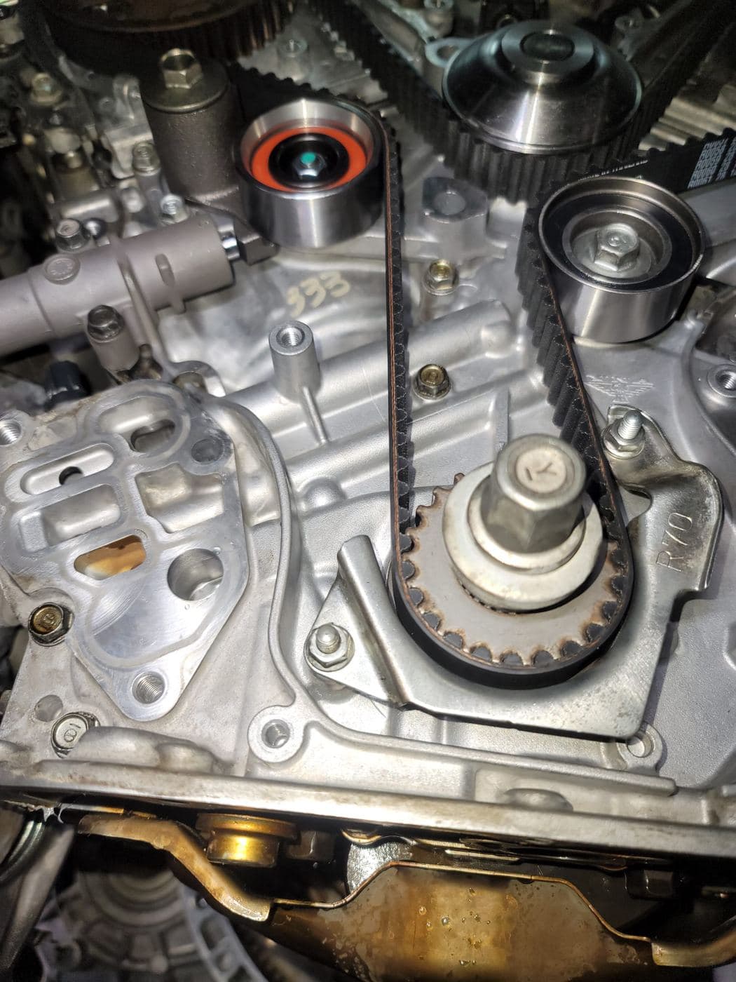Timing belt and tensioners on an engine
